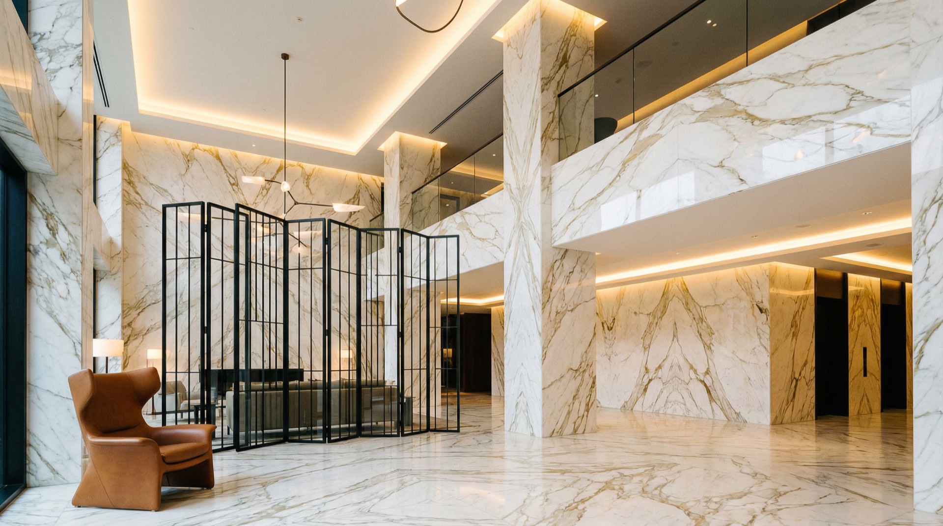 Double-height lobby in Calacatta marble